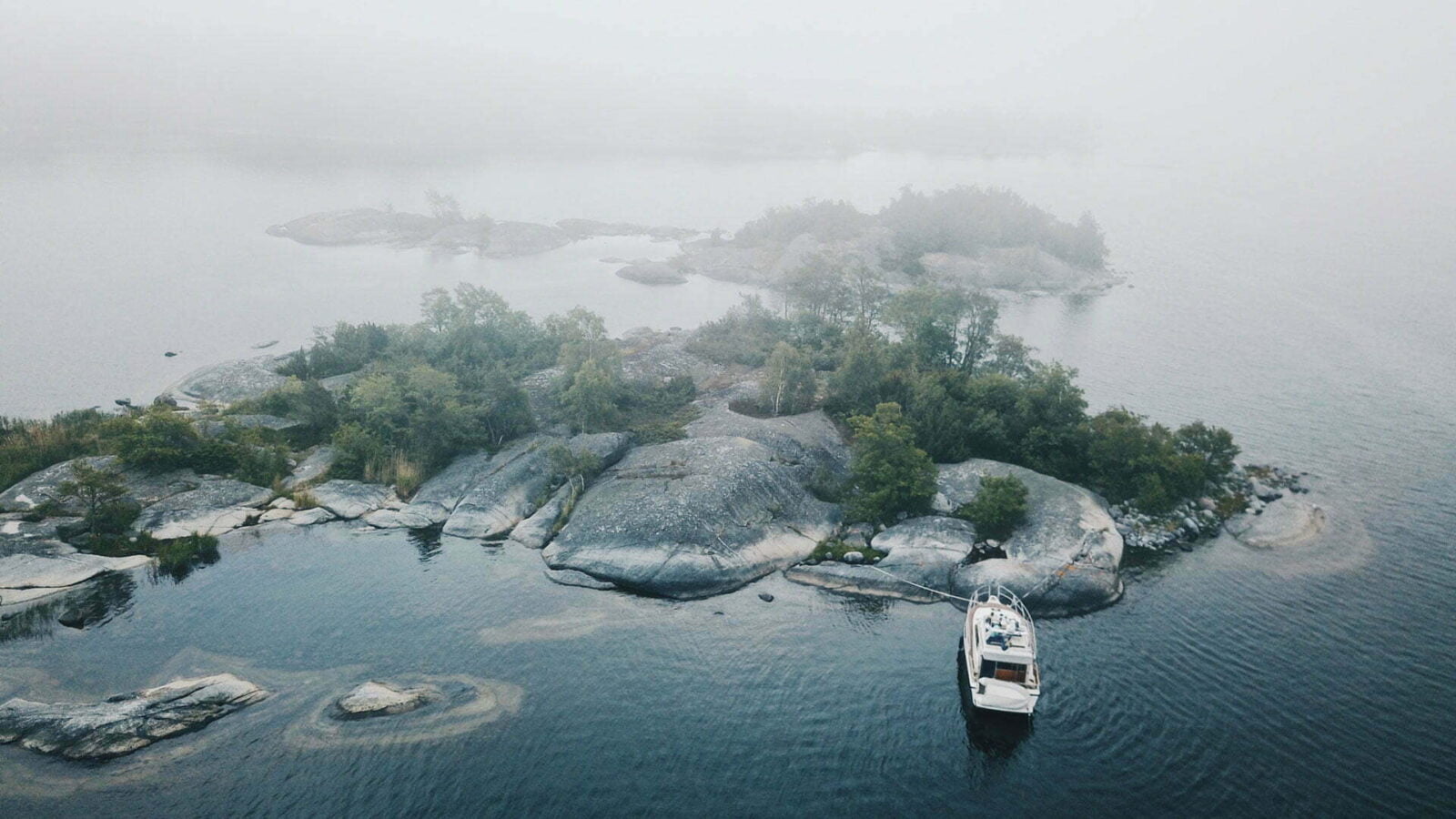 Boat tied to an island in Sweden